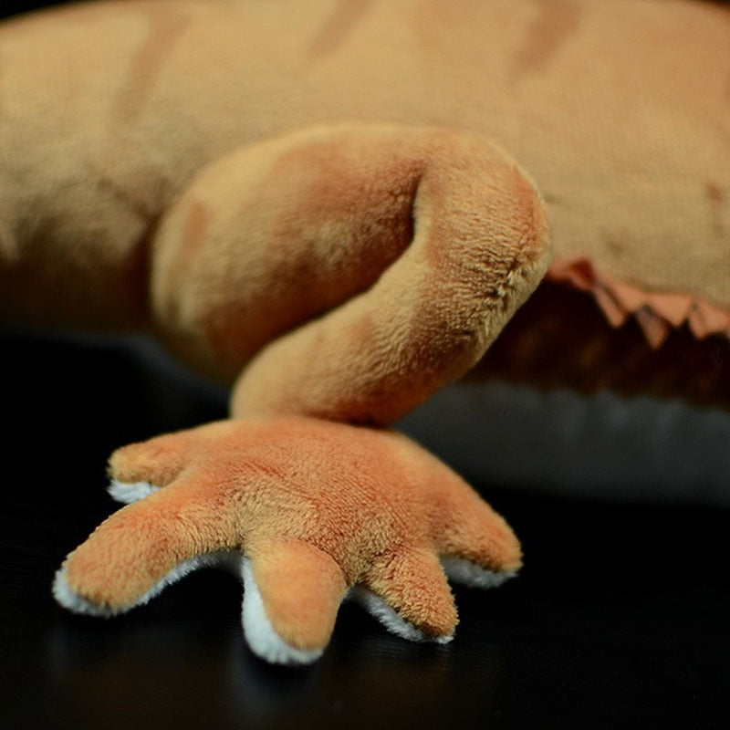 Měkká vycpaná plyšová hračka vousatého draka Pogona, která připomíná ještěrku